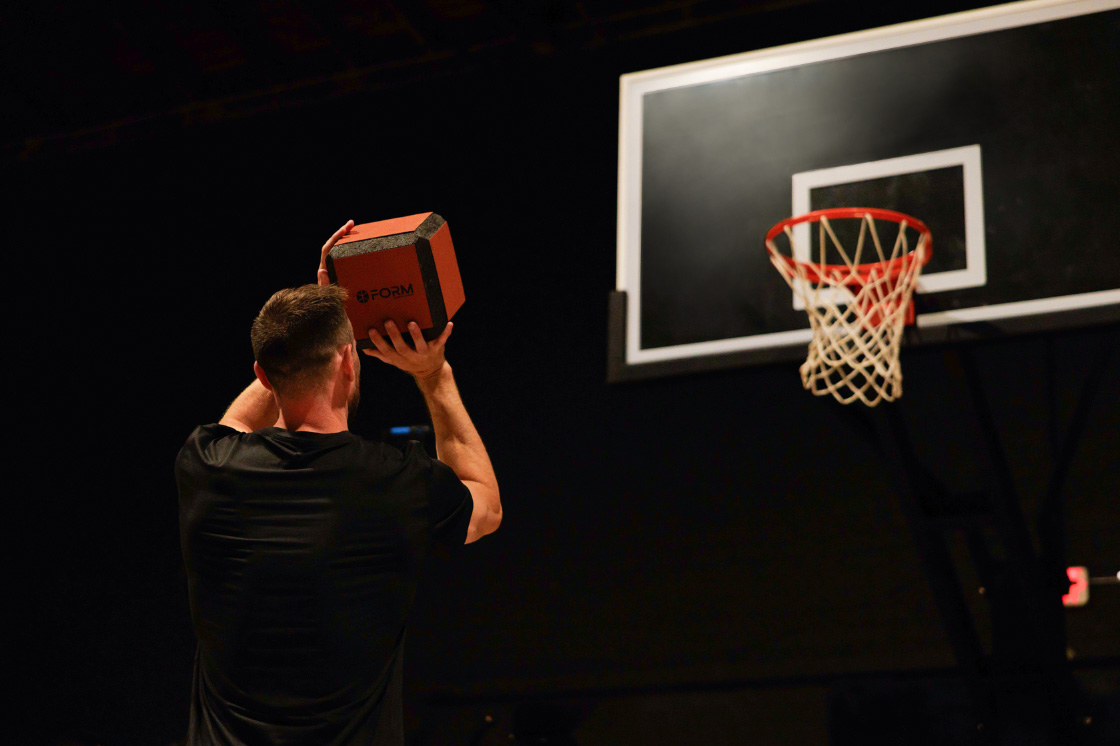 man training on basketball court